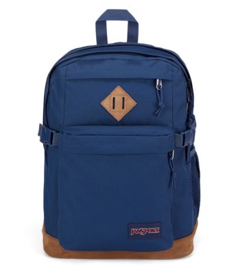 blue jansport backpack with leather