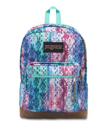 The JanSport Right Pack Expressions features a variety of prints, including animal prints, and colors on unique fabrications. This backpack includes signature suede leather bottom, 15 inch laptop sleeve and front pocket with organizer.