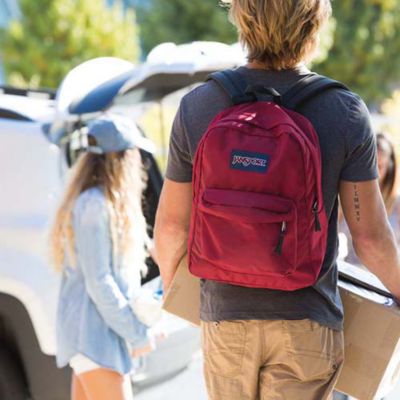 jansport red backpack with leather bottom